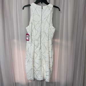 Ivory and silver sequin Vince Camuto dress.  New with tags size 12.